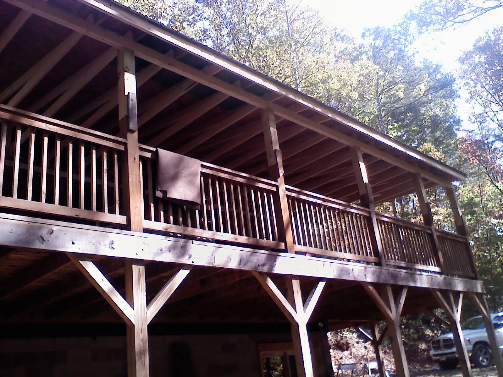 Timber framing under a new elevated porch and deck — Roof Leak Repair in Woodside by Roofing Brothers